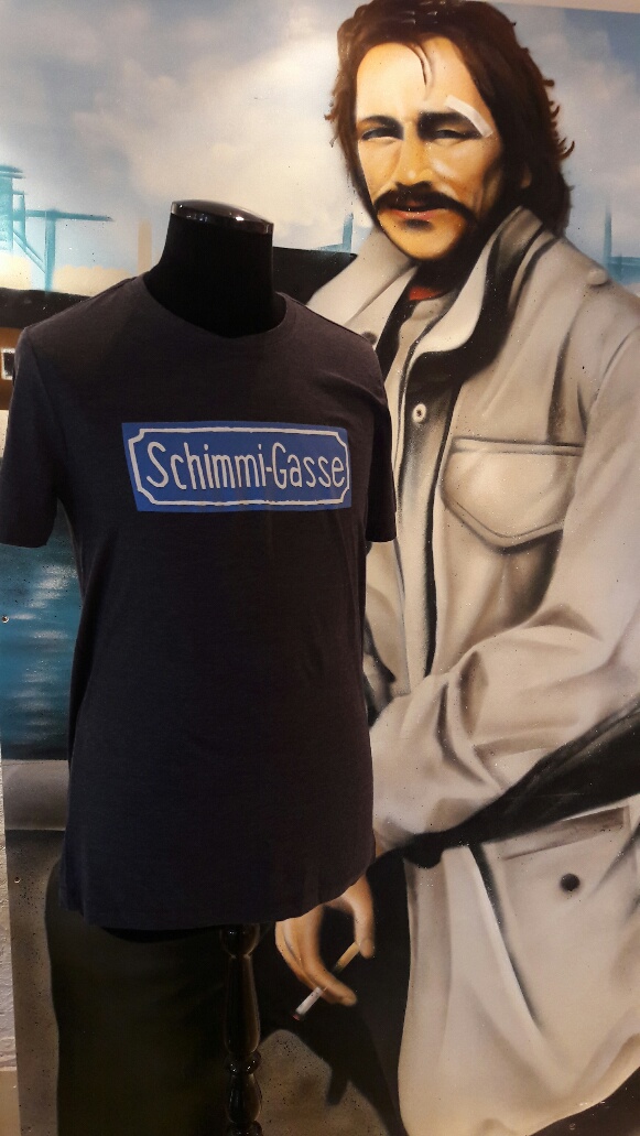 Restposten T-Shirt "Schimmi-Gasse" unifarben blau Restposten T-Shirt "Schimmi-Gasse" unifarben blau